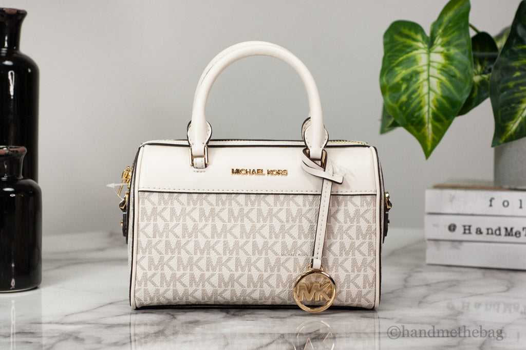 Michael Kors Travel XS Light Cream Signature PVC Duffle Crossbody Handbag